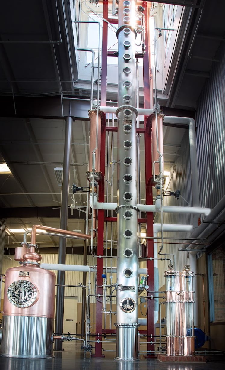 The forty foot high stainless steel and copper column still at Southern Distillers.